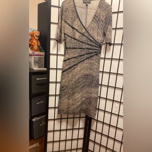 Woman’s brown and tan dress